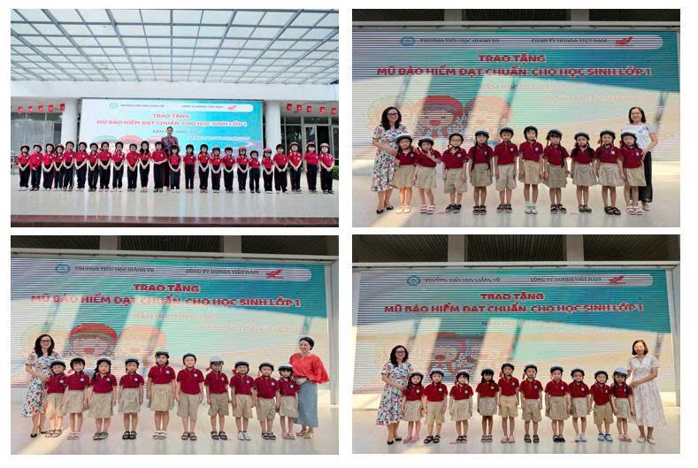 Học sinh lớp 1 trường Tiểu học Giảng Võ nhận mũ bảo hiểm – cùng em vững bước đến trường