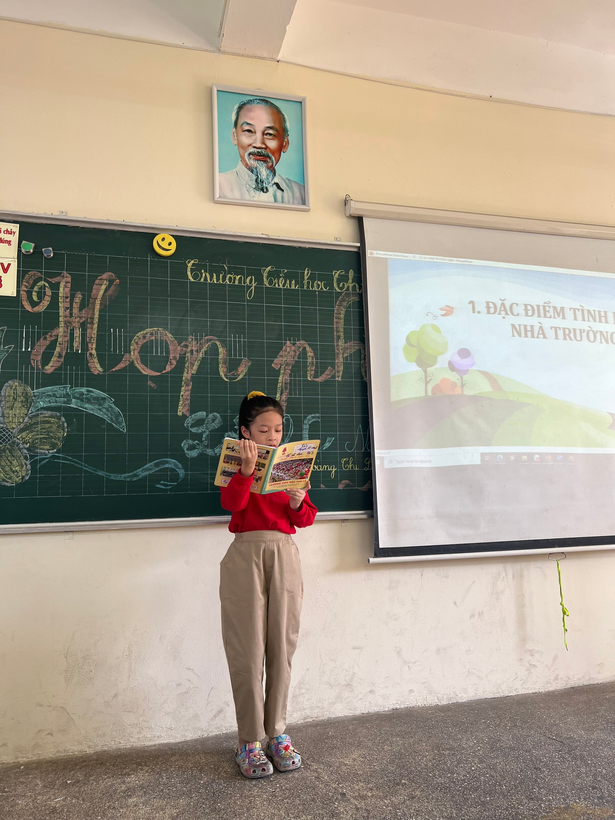 A child reading a book

Description automatically generated with medium confidence