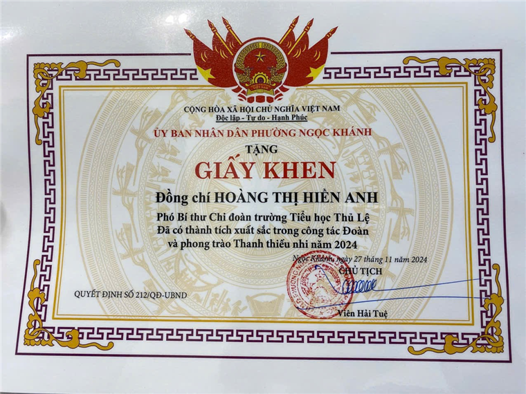 A certificate with red and gold design

Description automatically generated