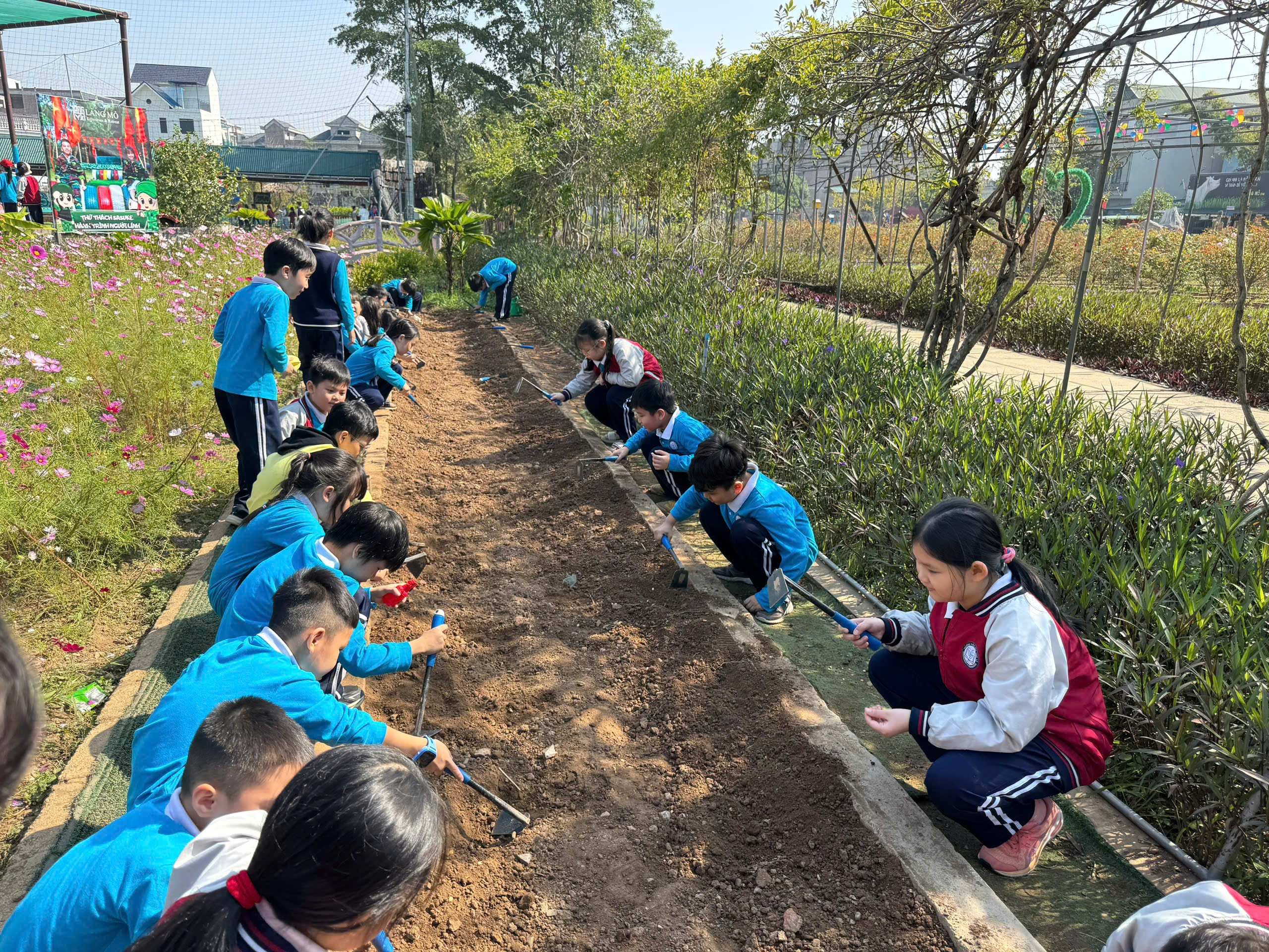 A group of people planting trees
AI-generated content may be incorrect.