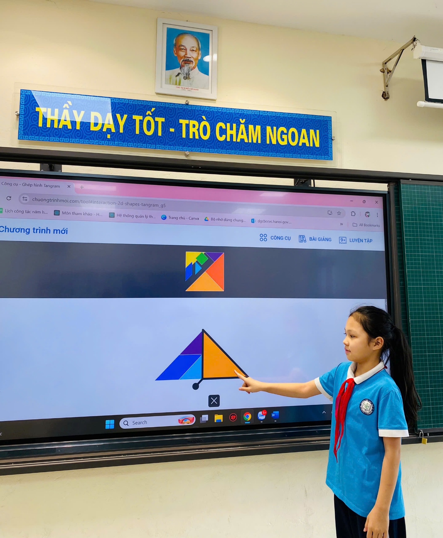 A child in a uniform pointing at a screen

AI-generated content may be incorrect.