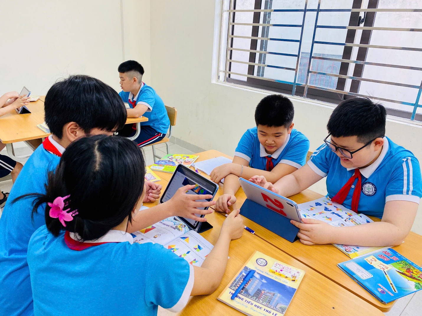 A group of children sitting at a table

AI-generated content may be incorrect.