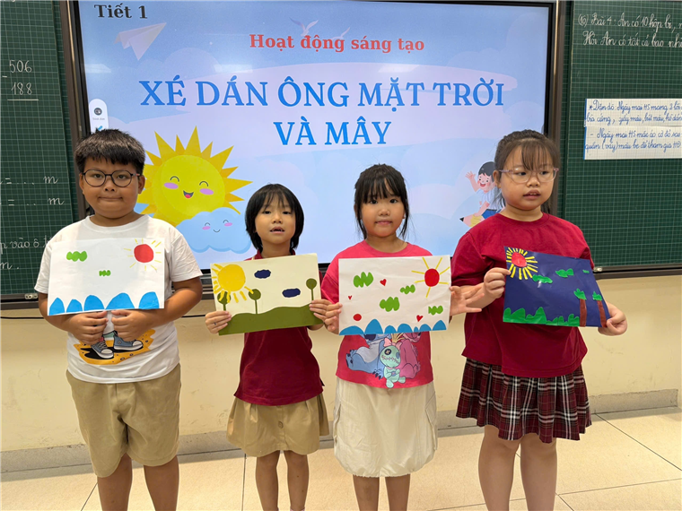 A group of children holding up art
AI-generated content may be incorrect.