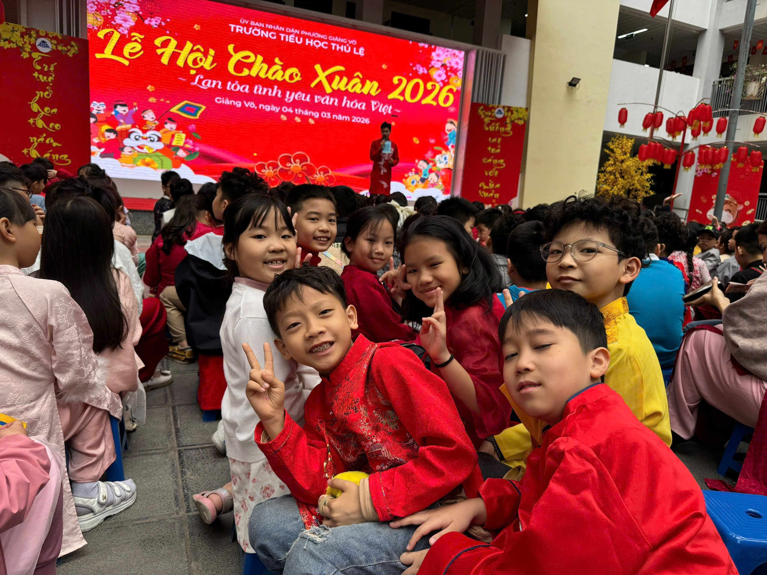 A group of children sitting on the ground

AI-generated content may be incorrect.